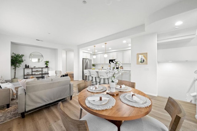 dining room featuring light hardwood / wood-style floors