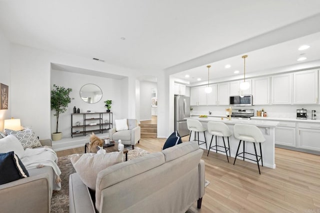 living room featuring light hardwood / wood-style flooring