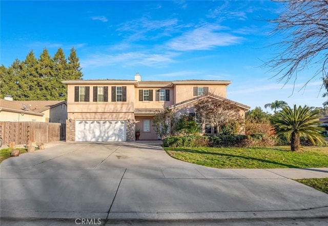 front facade with a front lawn and a garage