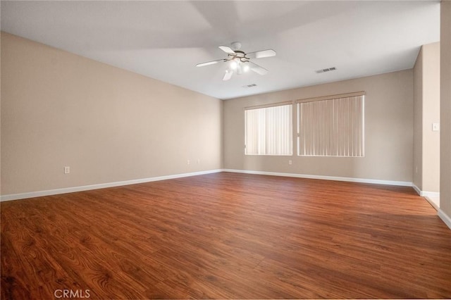 spare room featuring ceiling fan and wood-type flooring