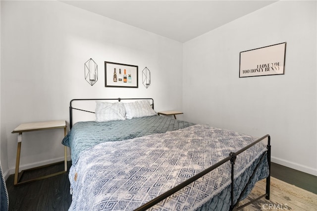 bedroom featuring hardwood / wood-style floors