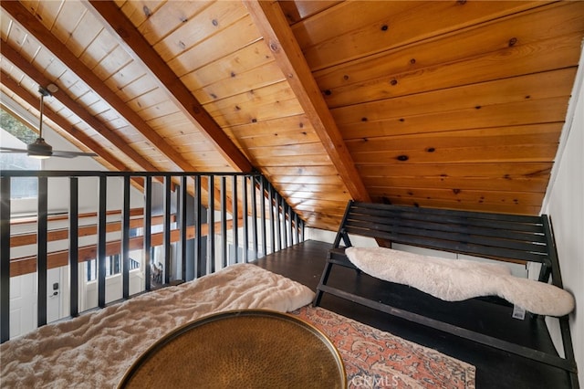 bedroom featuring lofted ceiling with beams and wood ceiling