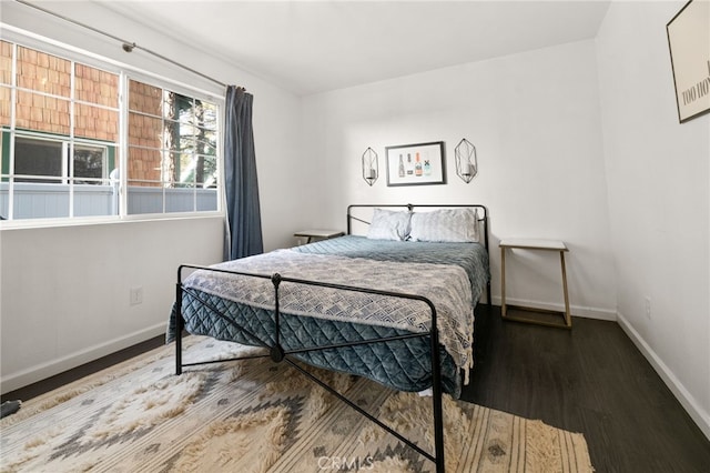 bedroom featuring wood-type flooring