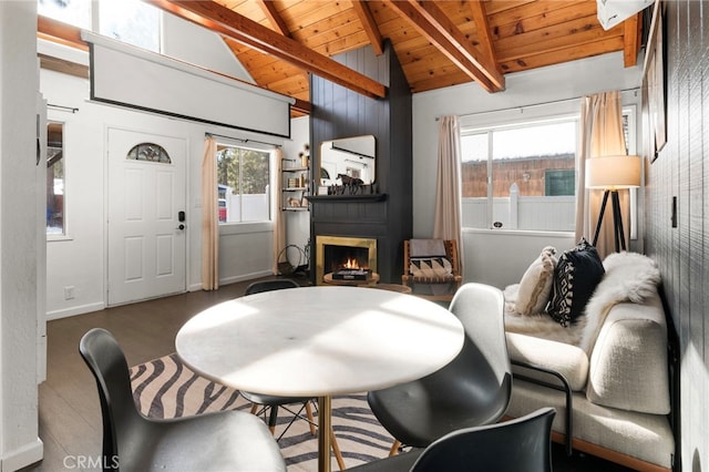 living area with dark wood-type flooring, wooden ceiling, high vaulted ceiling, and beam ceiling