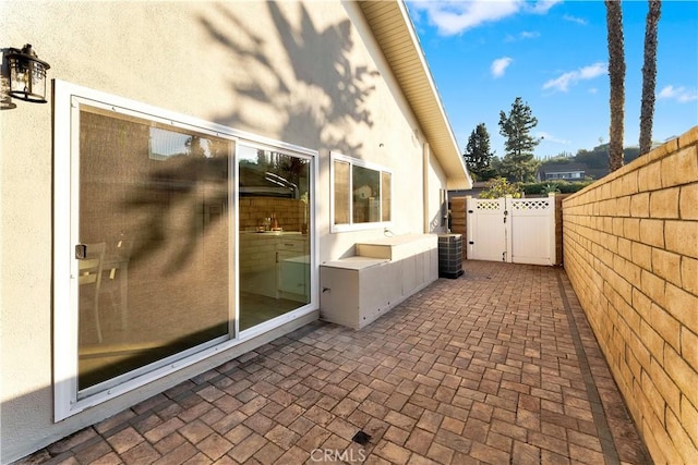 view of patio featuring cooling unit