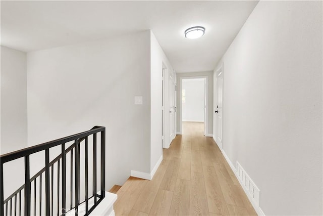 hallway featuring light wood-type flooring