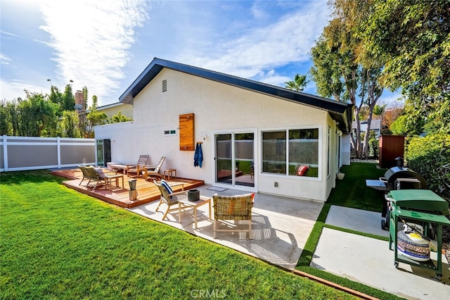 rear view of property with an outdoor hangout area, a patio, and a yard