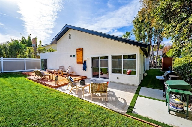 rear view of property featuring an outdoor hangout area, a yard, and a patio area