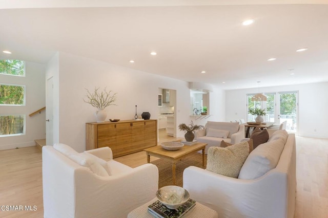 living room with light hardwood / wood-style floors