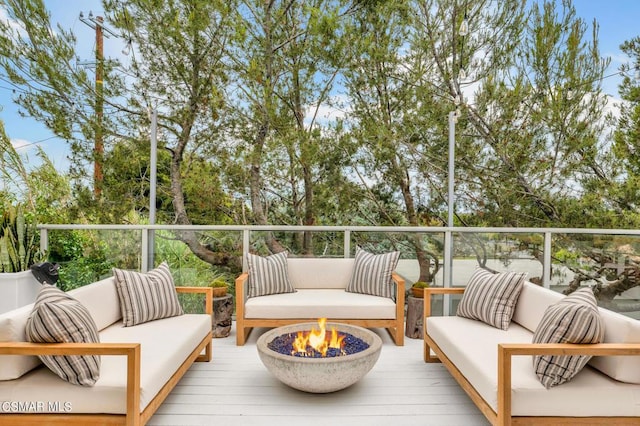 wooden deck featuring an outdoor hangout area