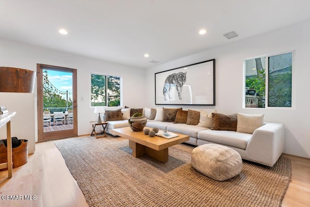 living room with light hardwood / wood-style floors