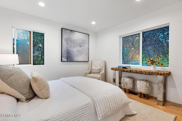 bedroom with light wood-type flooring