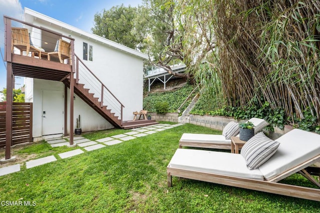 view of yard featuring a wooden deck