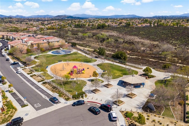 drone / aerial view featuring a mountain view