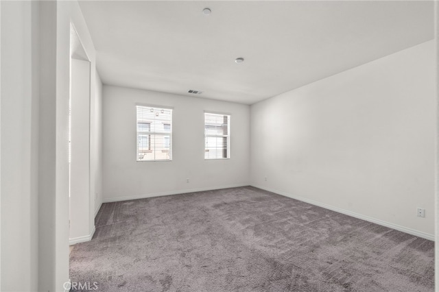 view of carpeted spare room