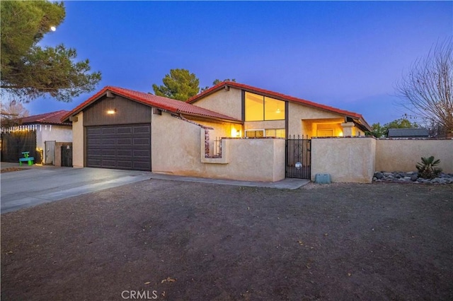 view of front of property featuring a garage