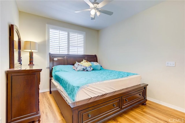 bedroom featuring ceiling fan and light wood-type flooring