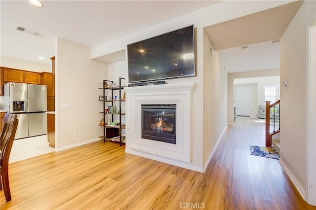 living room featuring light hardwood / wood-style flooring