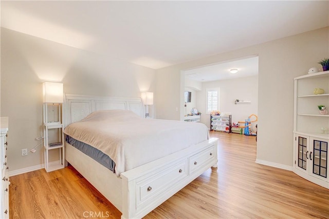 bedroom featuring light hardwood / wood-style floors