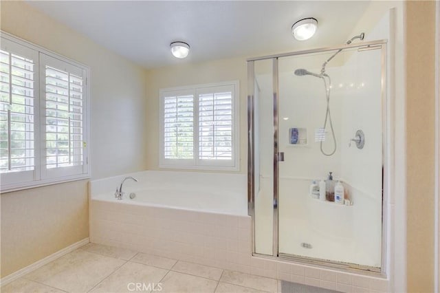 bathroom with tile patterned floors and plus walk in shower