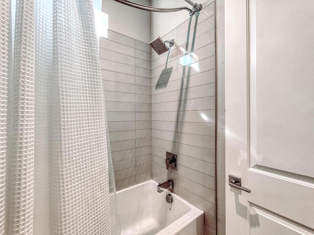 bathroom featuring shower / bath combo with shower curtain