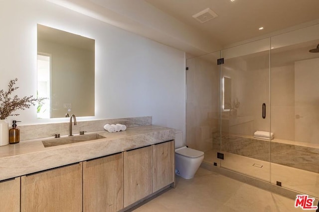 bathroom with toilet, walk in shower, tile patterned floors, and vanity