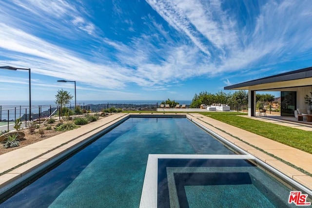 view of pool featuring a water view