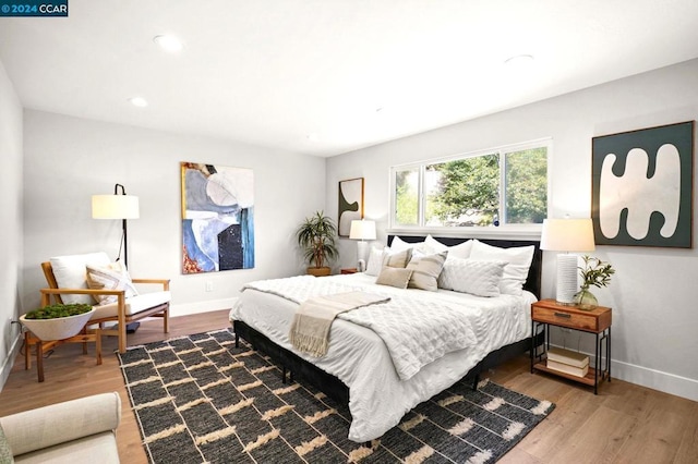 bedroom featuring hardwood / wood-style flooring