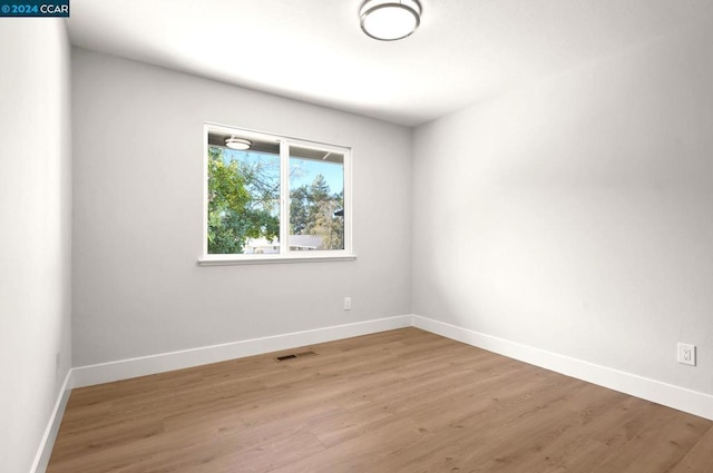 empty room featuring light hardwood / wood-style flooring