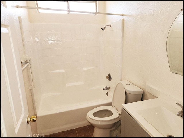 full bathroom with toilet, vanity, tile patterned flooring, and washtub / shower combination