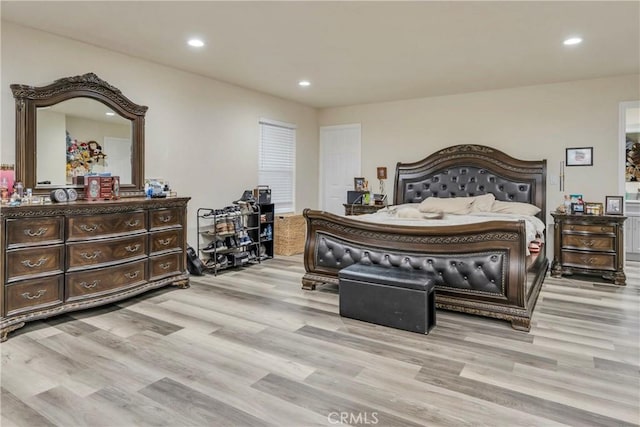 bedroom featuring light hardwood / wood-style floors