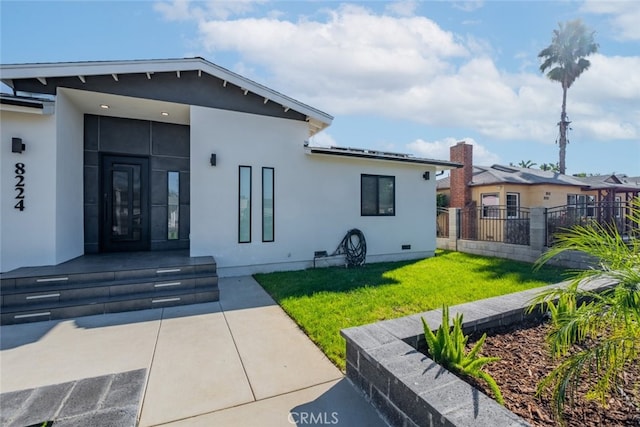 exterior space featuring a lawn