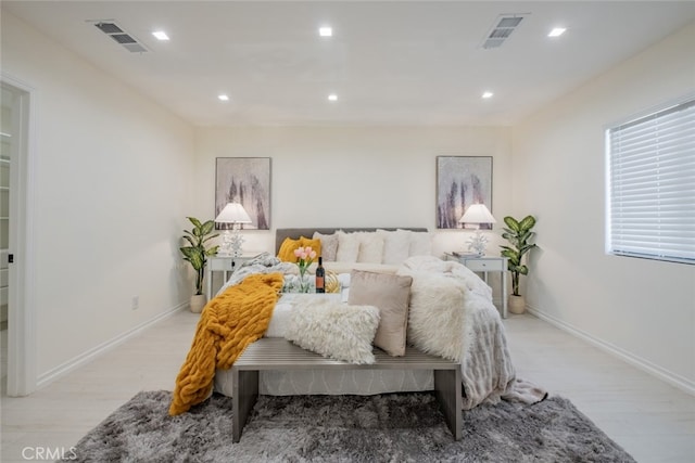 bedroom featuring light hardwood / wood-style floors