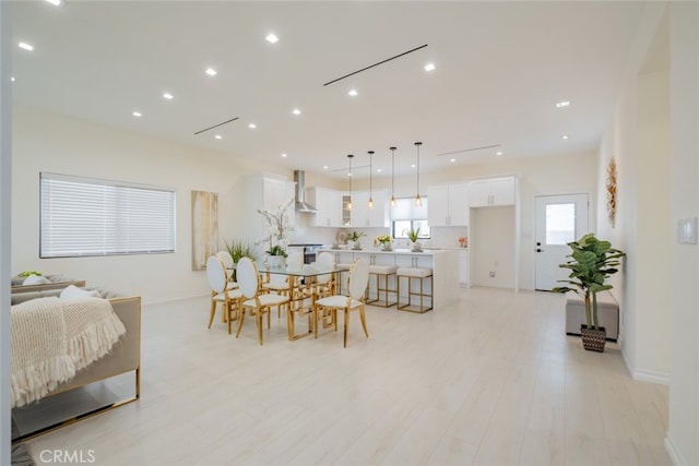 dining room with light wood-type flooring