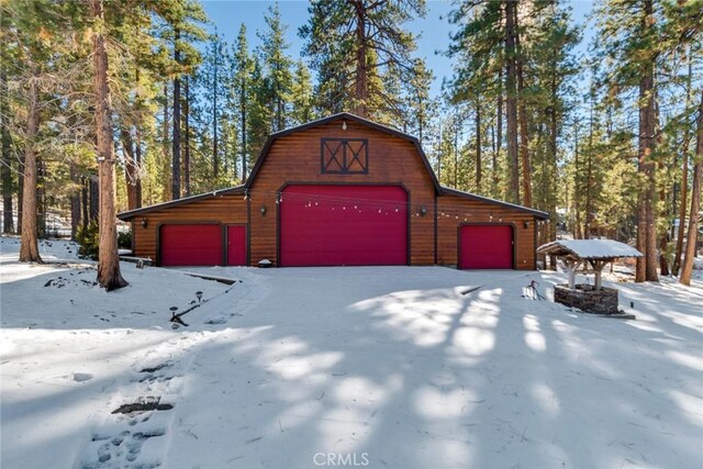 view of snow covered garage