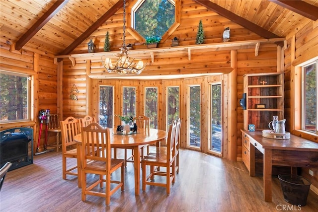 dining space featuring beam ceiling, hardwood / wood-style flooring, wooden ceiling, and a chandelier