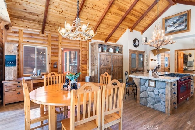 dining space with wood finished floors, wooden ceiling, beamed ceiling, and an inviting chandelier