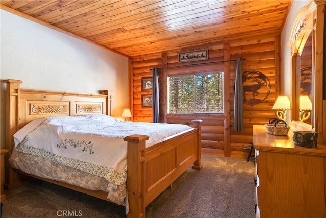 carpeted bedroom featuring wood ceiling