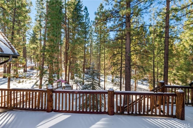 view of snow covered deck