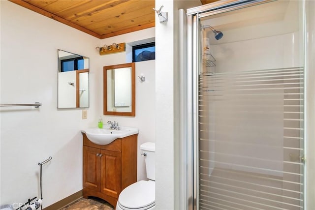 bathroom with vanity, toilet, wooden ceiling, and a shower with shower door