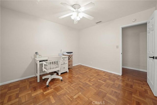 office area featuring parquet floors and ceiling fan