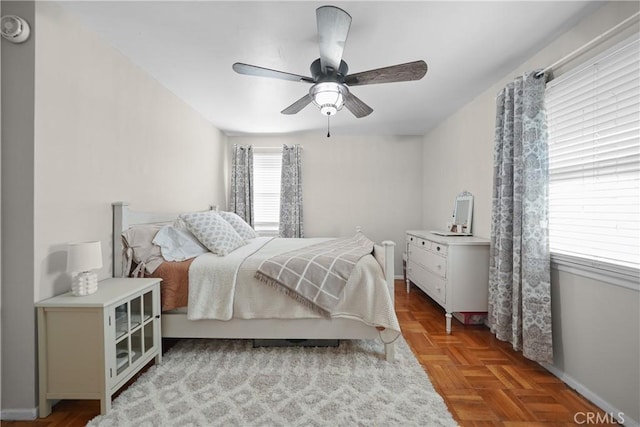 bedroom featuring light parquet floors and ceiling fan