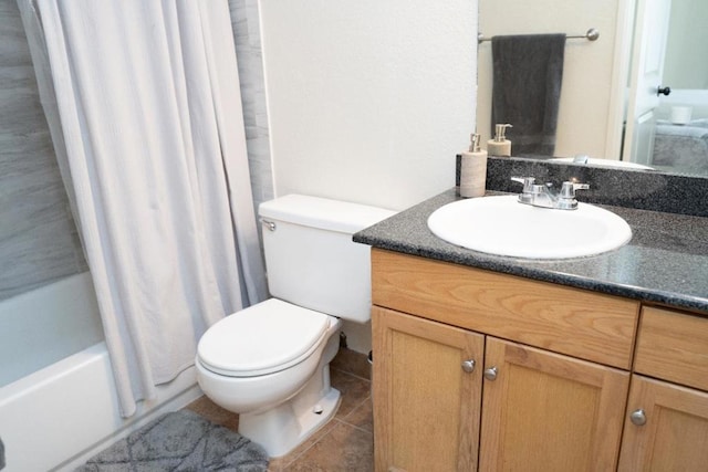 full bathroom featuring tile patterned floors, toilet, vanity, and shower / tub combo with curtain