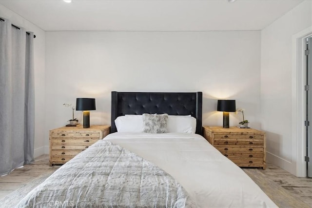 bedroom featuring light wood-type flooring