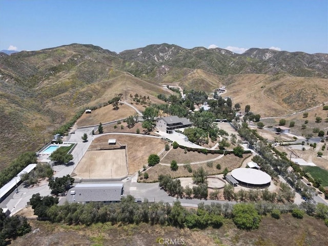 drone / aerial view featuring a mountain view