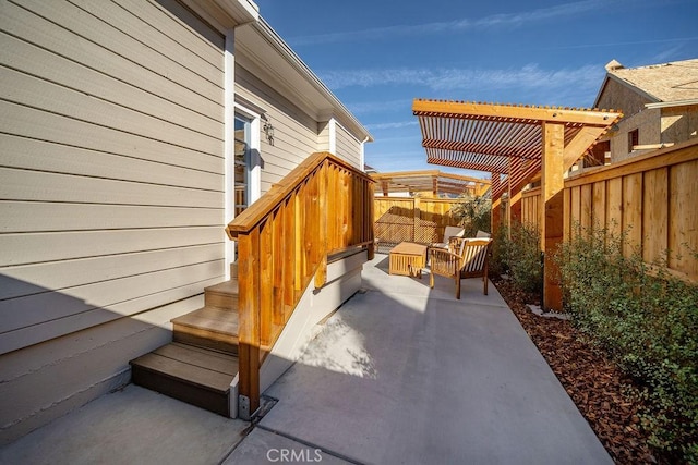 view of patio / terrace featuring a pergola and outdoor lounge area