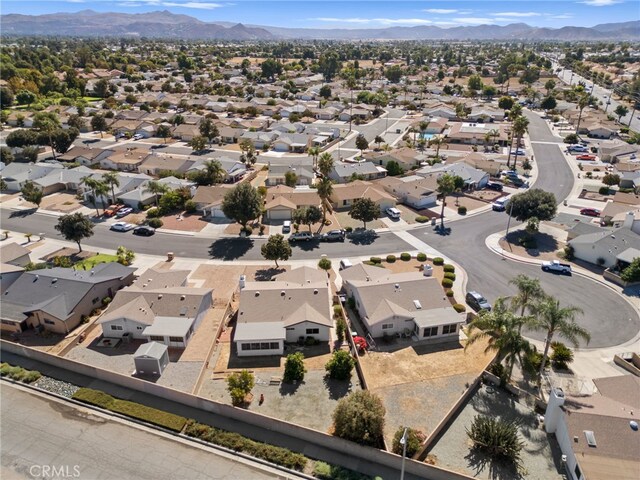 drone / aerial view featuring a mountain view