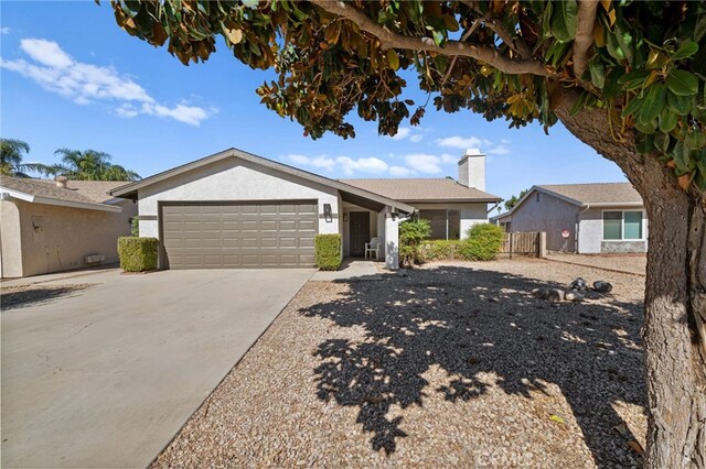 single story home featuring a garage