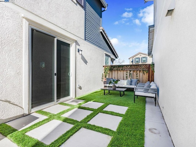 exterior space with an outdoor hangout area