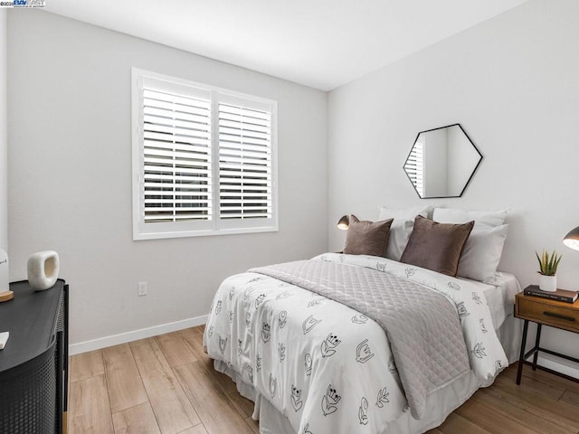 bedroom featuring light hardwood / wood-style floors